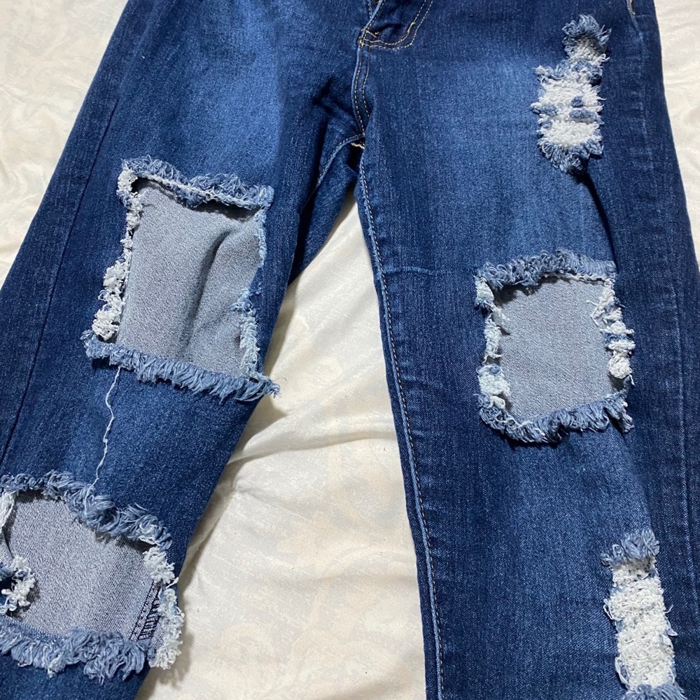 Blue Jean ripped jeans